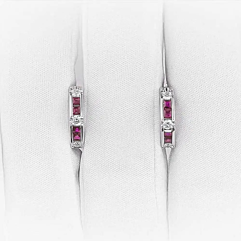 Серьги с бриллиантом из белого золота 750 пробы 1