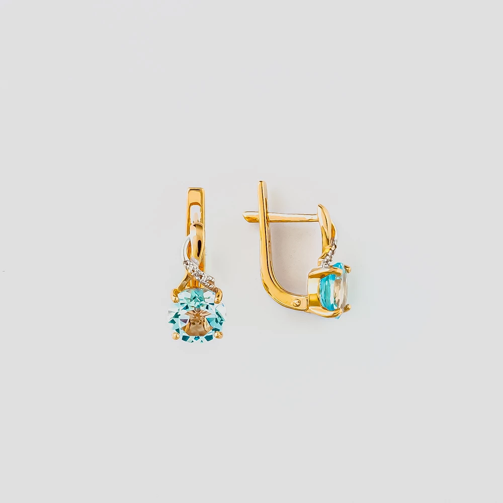 Серьги с топазом из красного золота 585 пробы