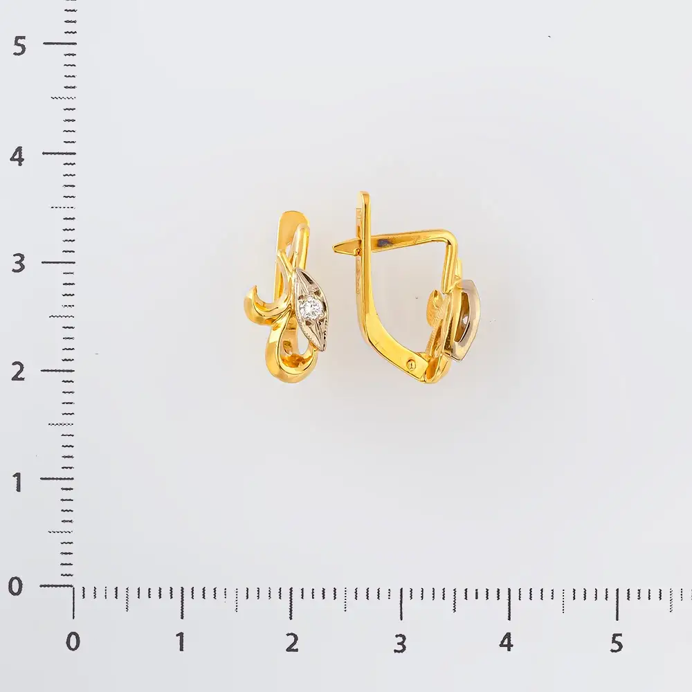 Серьги с бриллиантом из желтого золота 750 пробы 2
