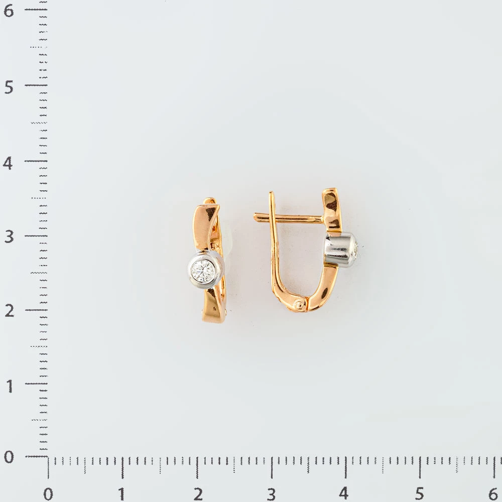 Серьги с бриллиантом из красного золота 585 пробы