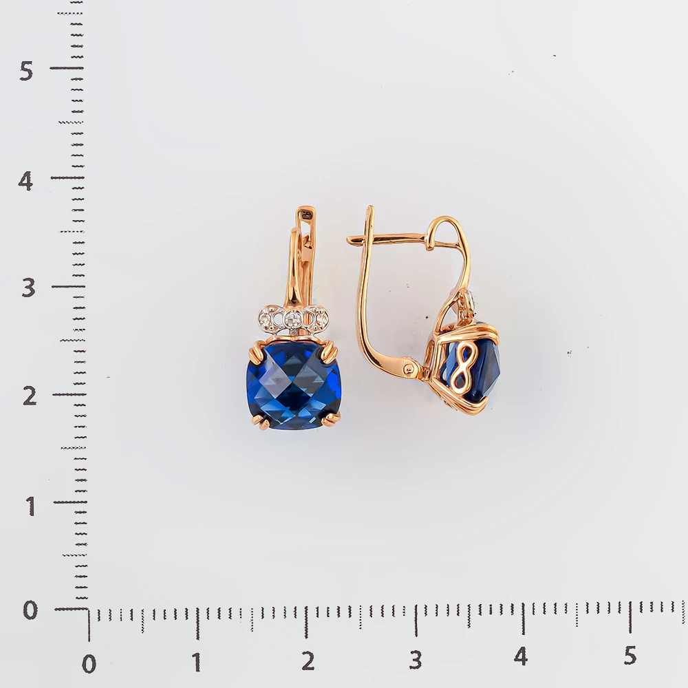 Серьги с сапфиром синтетическим из красного золота 375 пробы