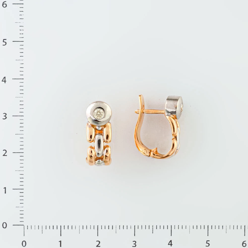 Серьги с бриллиантом из красного золота 585 пробы