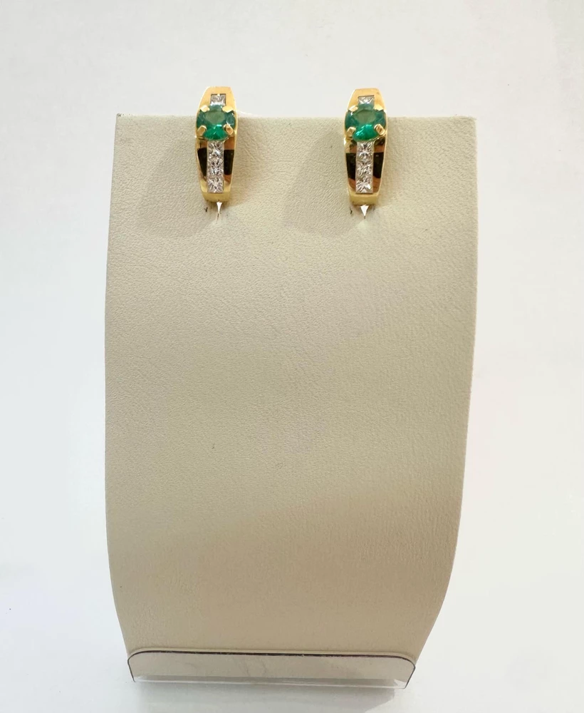 Серьги с изумрудом из желтого золота 750 пробы