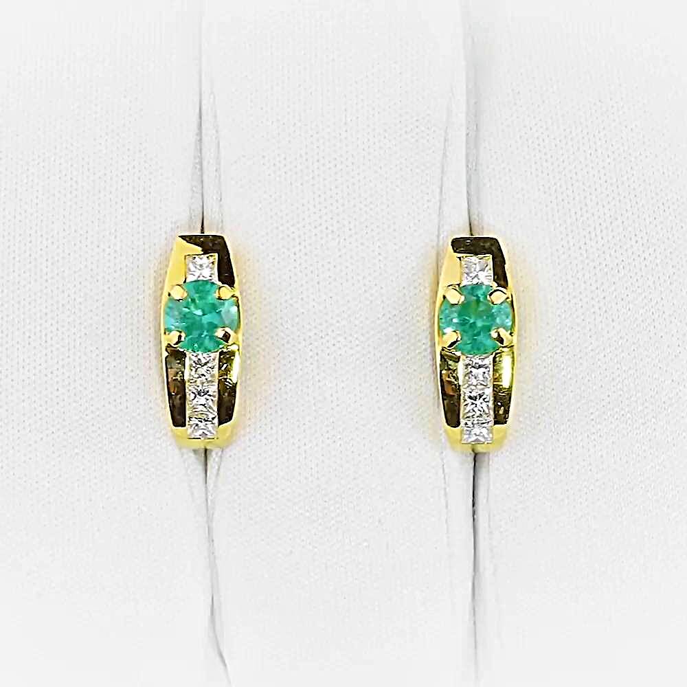 Серьги с изумрудом из желтого золота 750 пробы