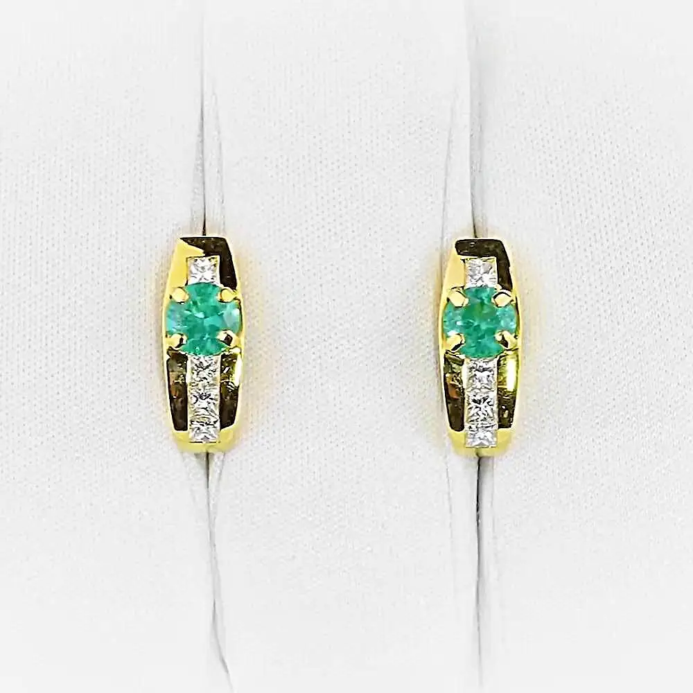 Серьги с изумрудом из желтого золота 750 пробы 2