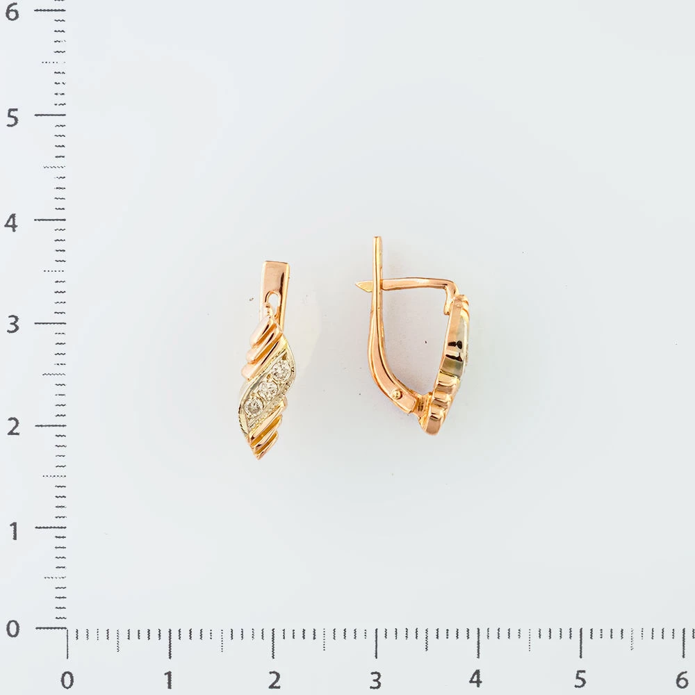Серьги с бриллиантом из красного золота 585 пробы