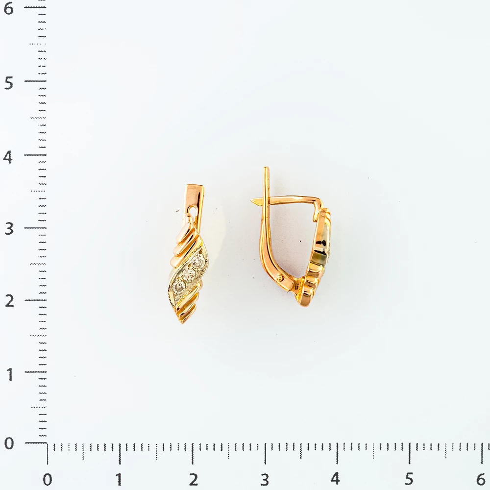Серьги с бриллиантом из красного золота 585 пробы