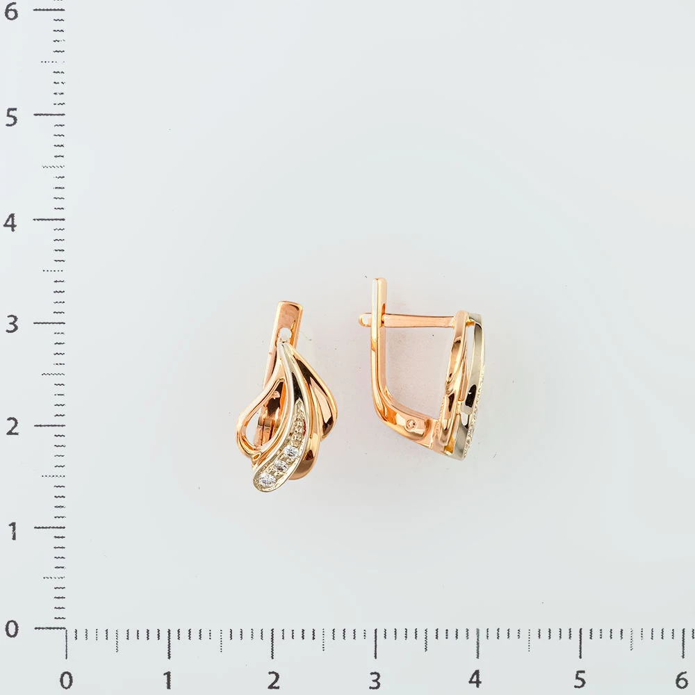 Серьги с бриллиантом из красного золота 585 пробы
