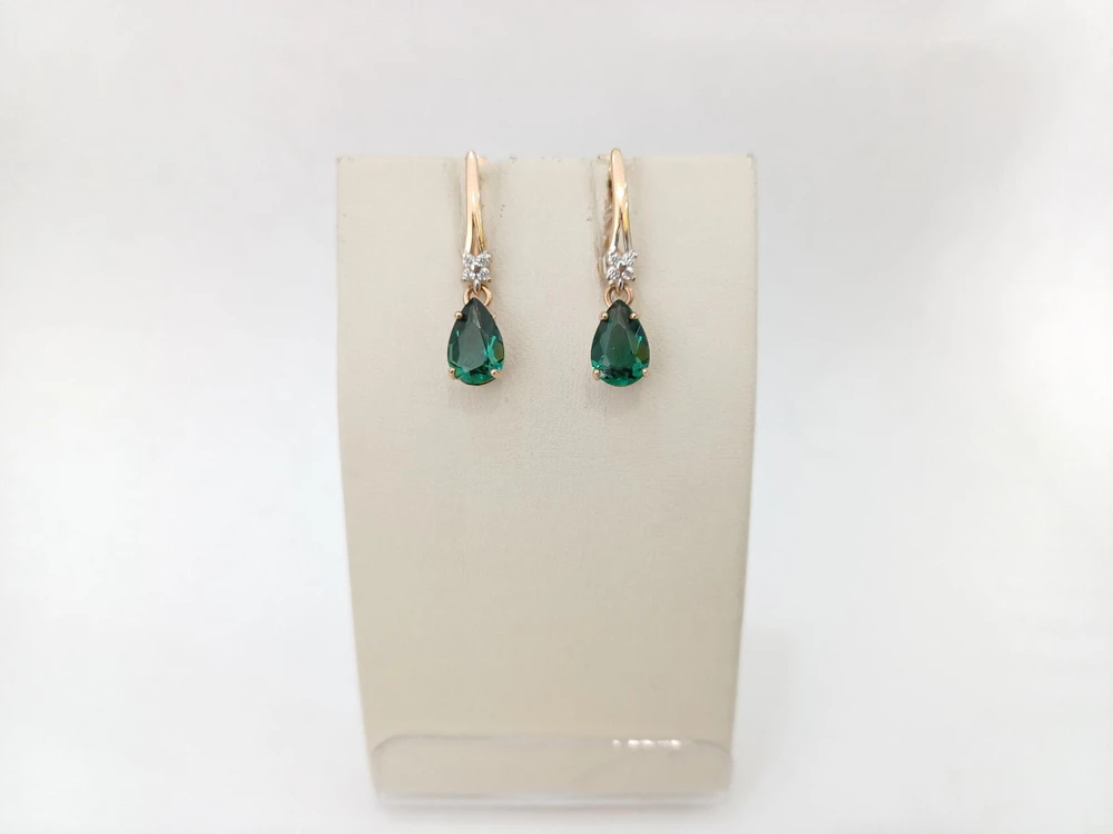 Серьги с изумрудом синтетическим из красного золота 375 пробы