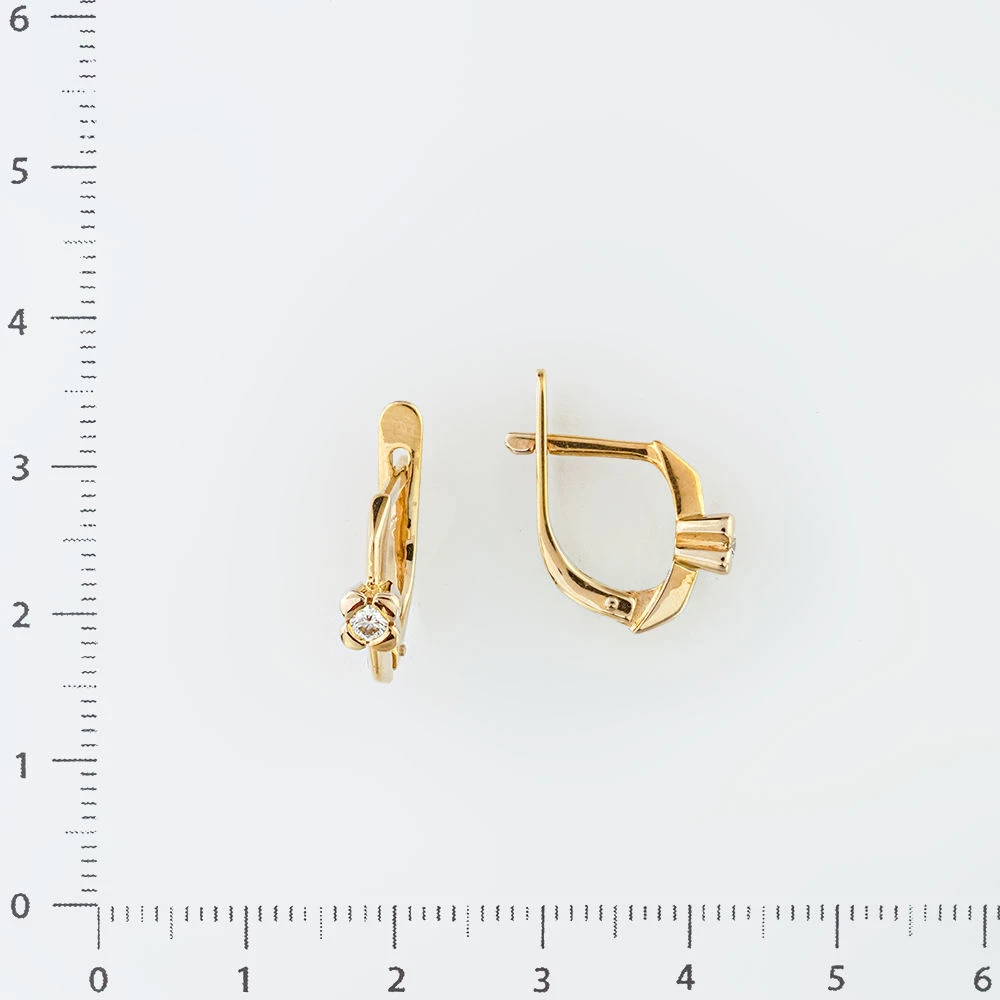 Серьги с бриллиантом из желтого золота 750 пробы