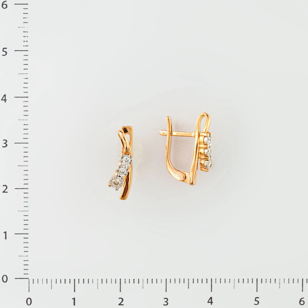 Серьги с бриллиантом из красного золота 585 пробы