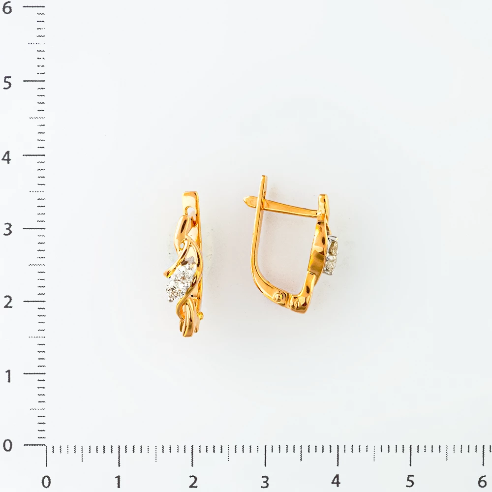 Серьги с бриллиантом из красного золота 585 пробы