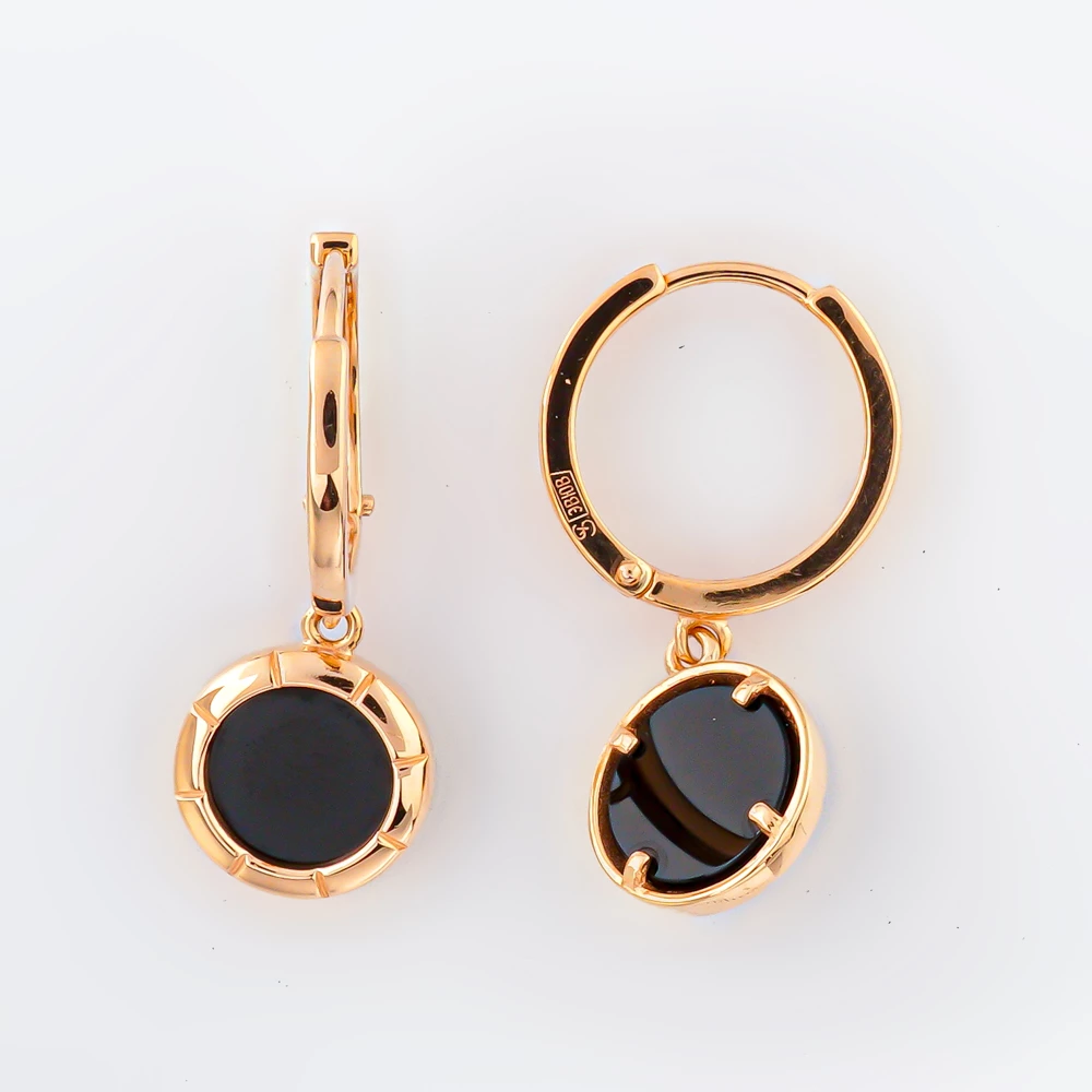 Серьги с ониксом из красного золота 585 пробы