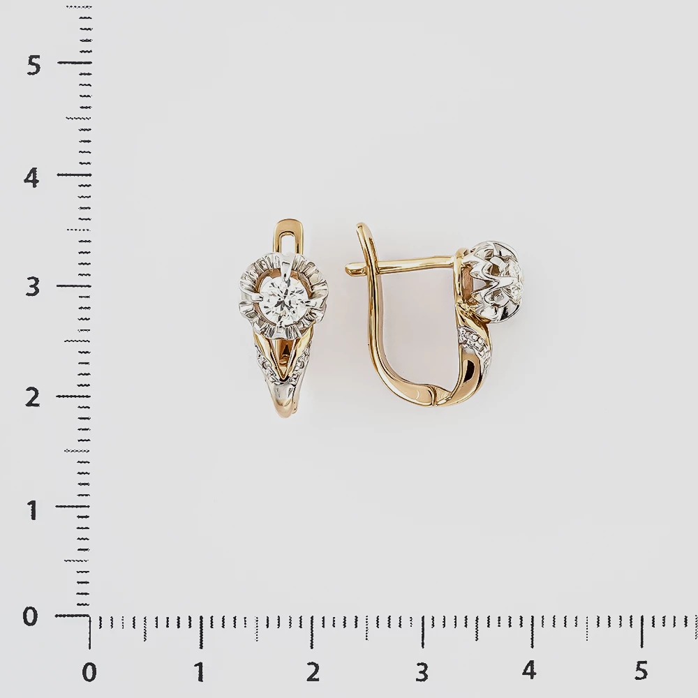 Серьги с бриллиантом из красного золота 585 пробы