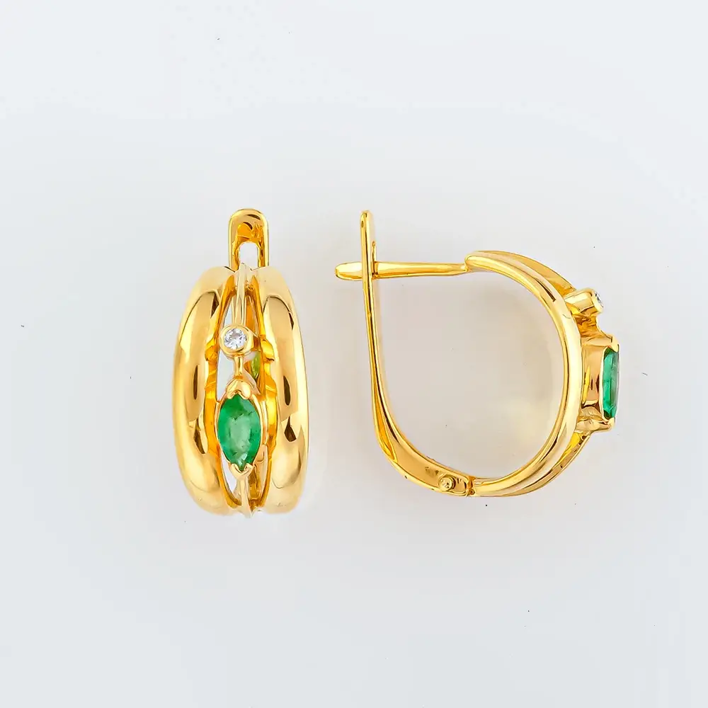 Серьги с изумрудом из желтого золота 750 пробы