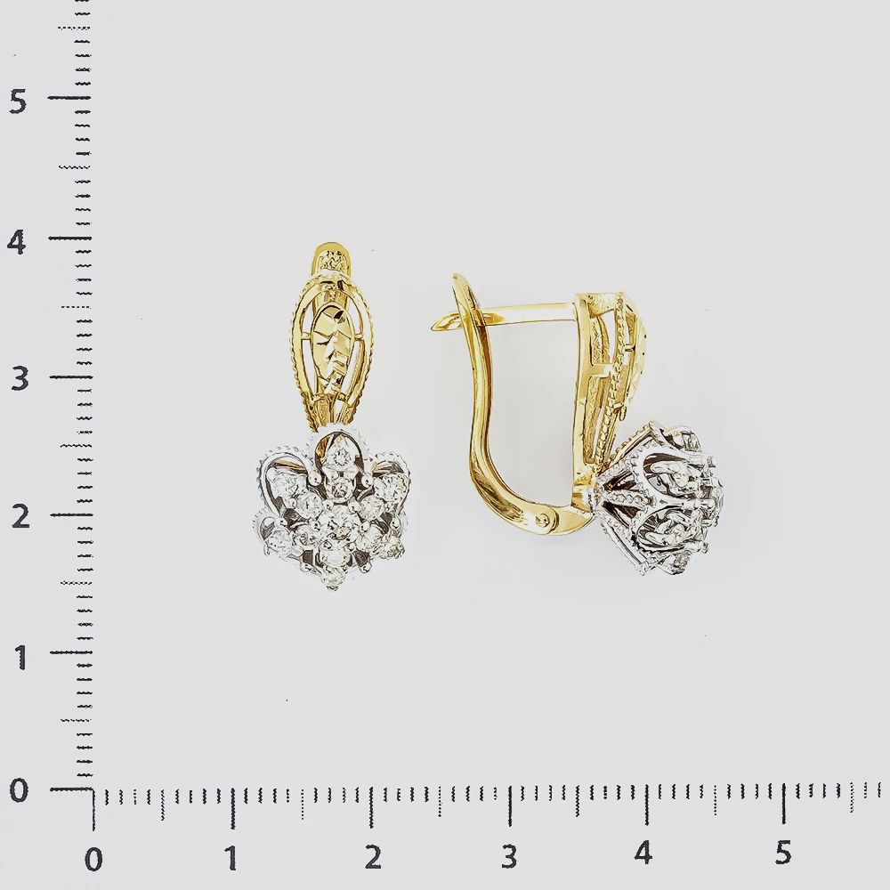 Серьги с бриллиантом из желтого золота 750 пробы