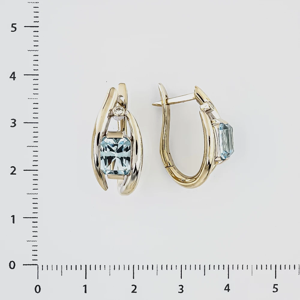 Серьги с топазом из белого золота 750 пробы