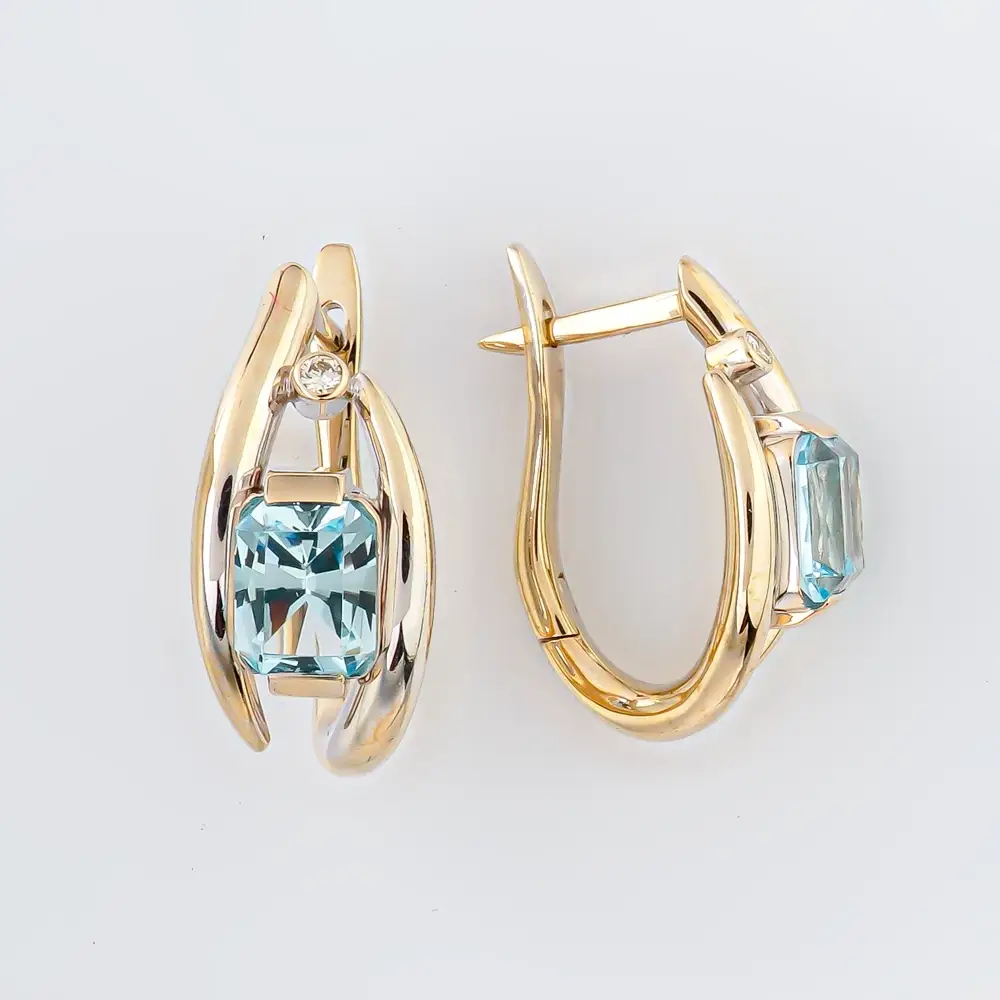 Серьги с топазом из белого золота 750 пробы 1