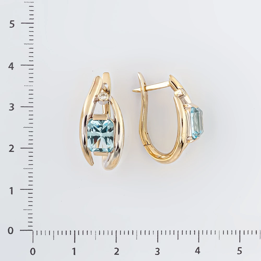Серьги с топазом из белого золота 750 пробы