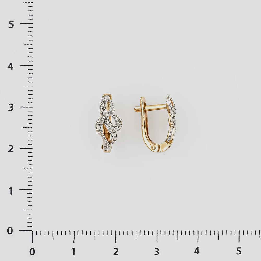 Серьги с бриллиантом из красного золота 585 пробы