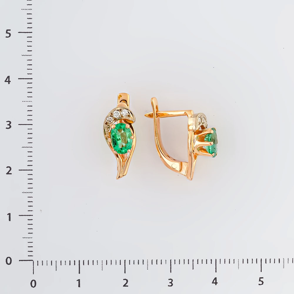 Серьги с изумрудом из красного золота 585 пробы