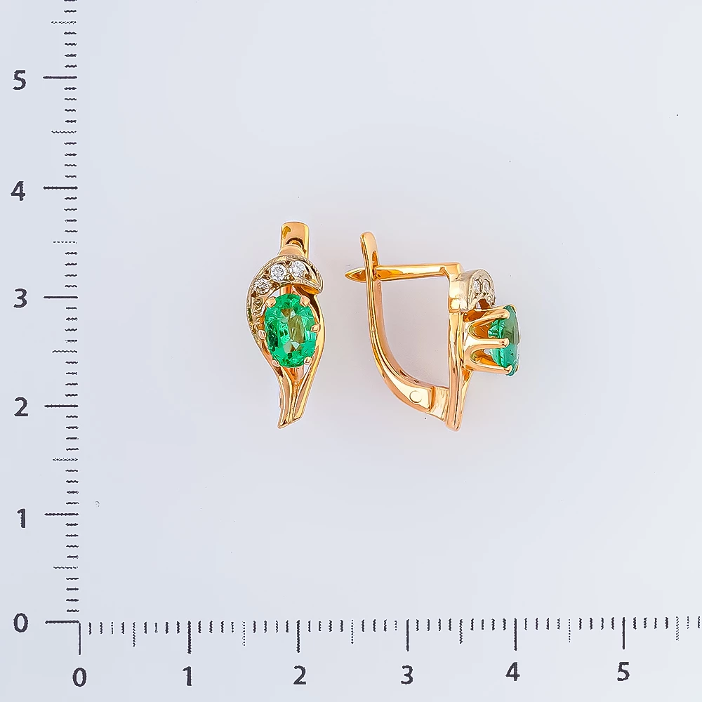Серьги с изумрудом из красного золота 585 пробы