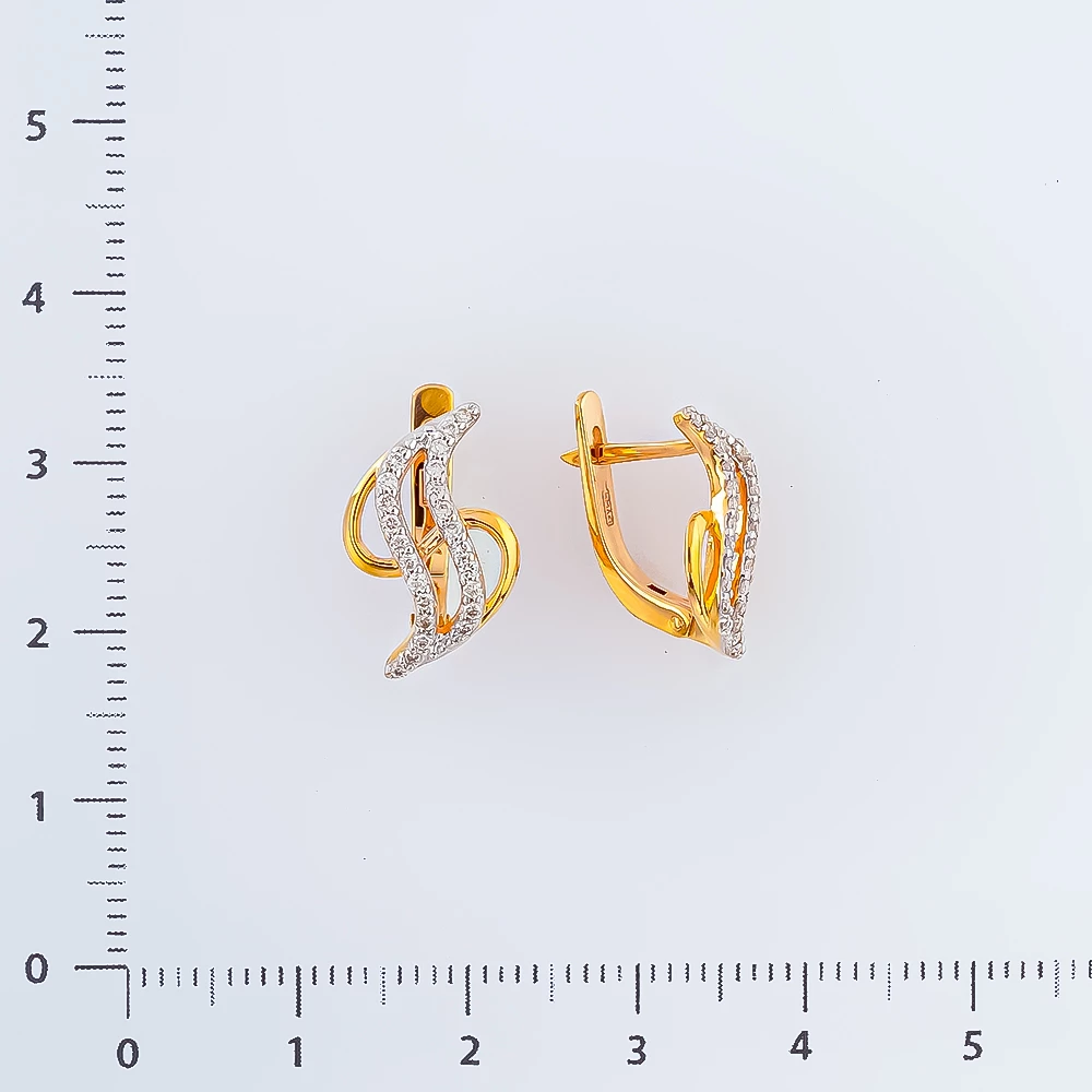 Серьги с бриллиантом из красного золота 585 пробы