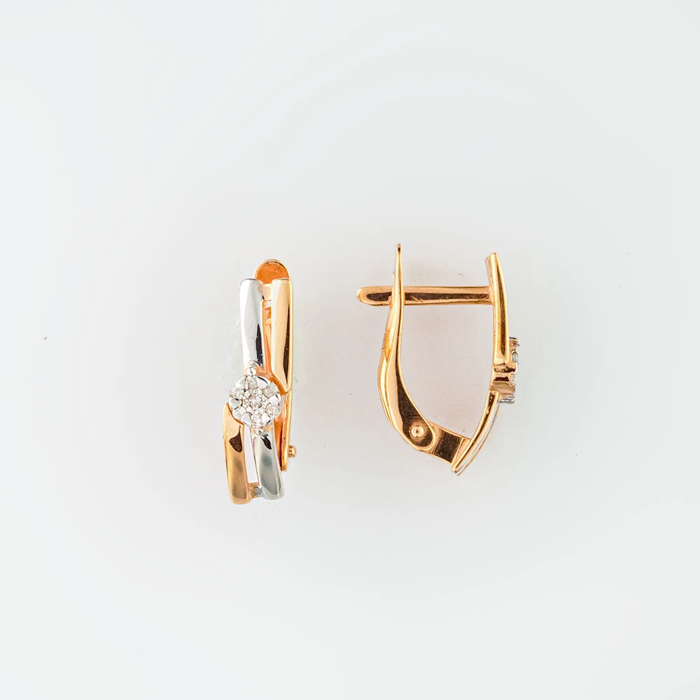 Серьги с бриллиантом из красного золота 585 пробы