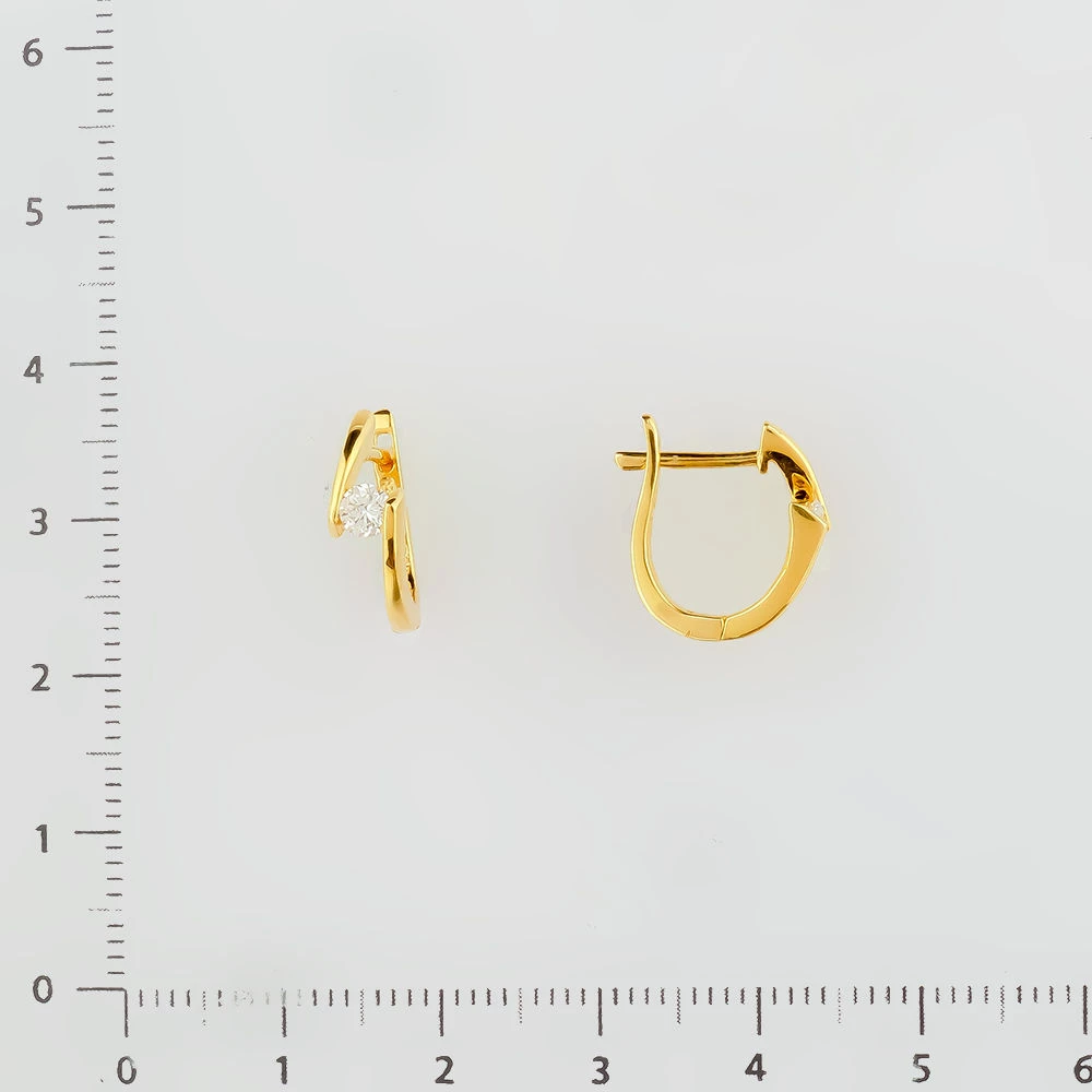 Серьги с бриллиантом из желтого золота 750 пробы
