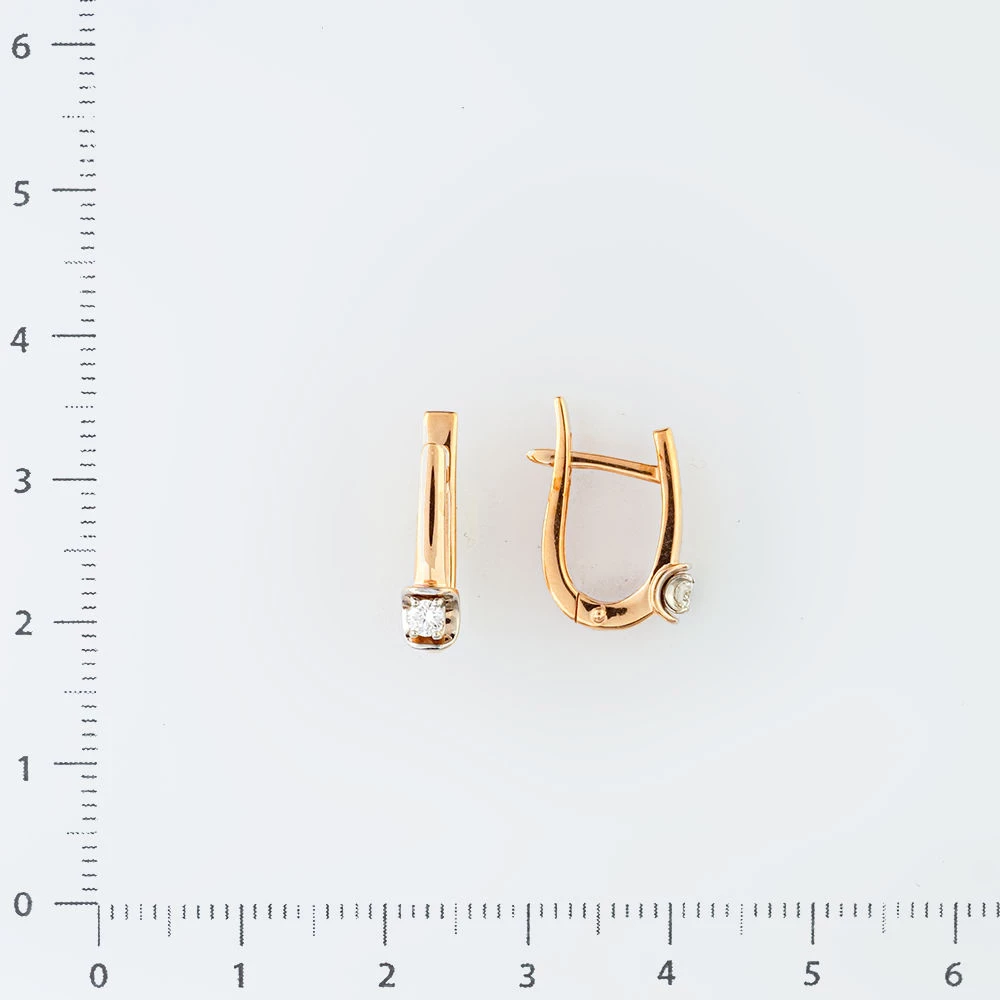 Серьги с бриллиантом из красного золота 585 пробы
