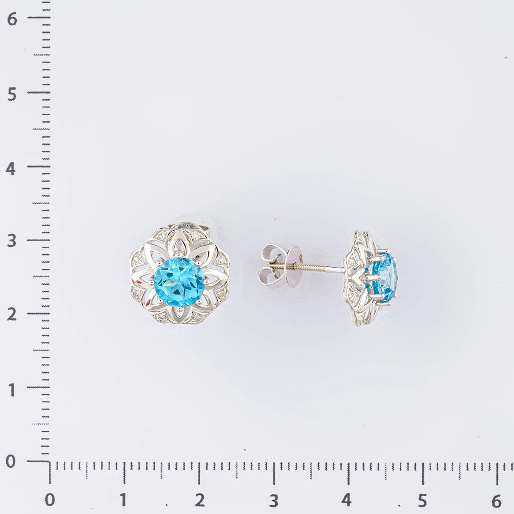 Серьги с топазом из белого золота 585 пробы