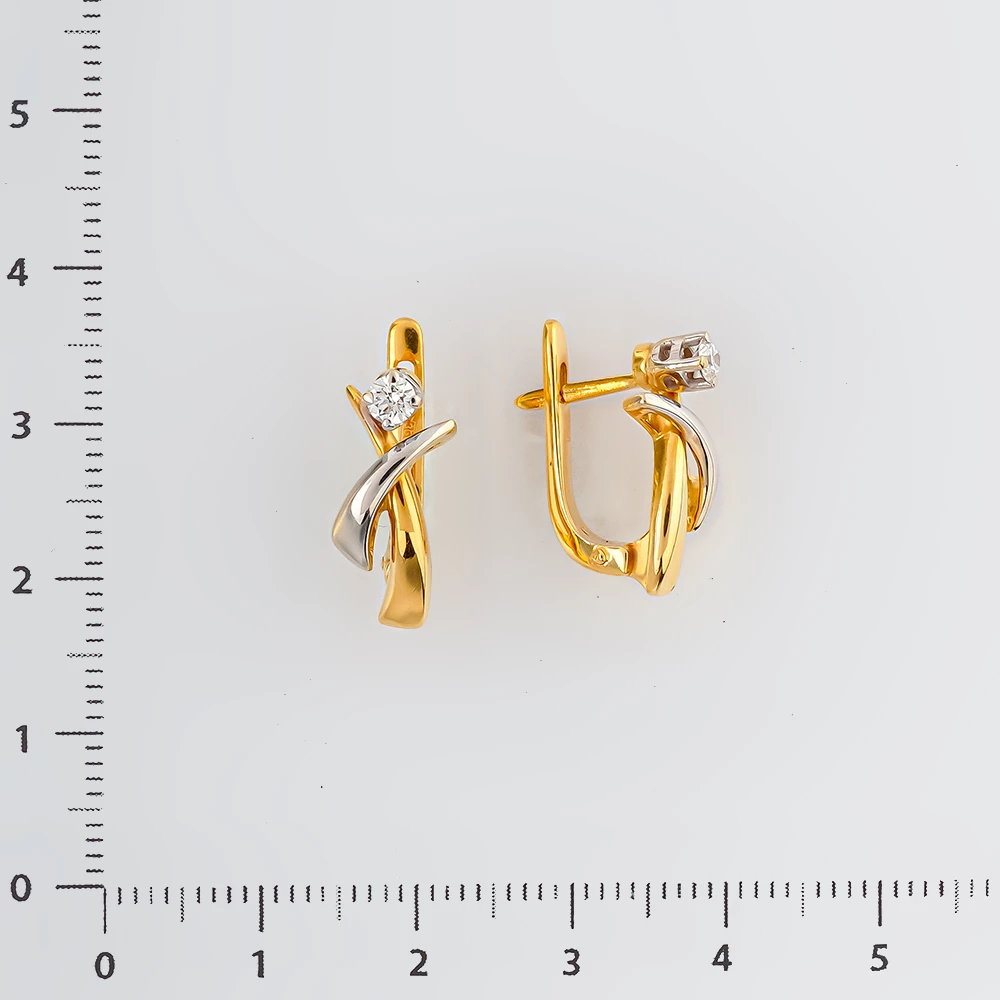 Серьги с бриллиантом из желтого золота 750 пробы