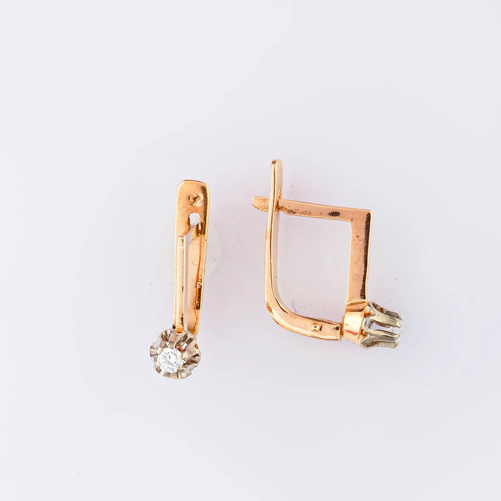 Серьги с бриллиантом из красного золота 585 пробы