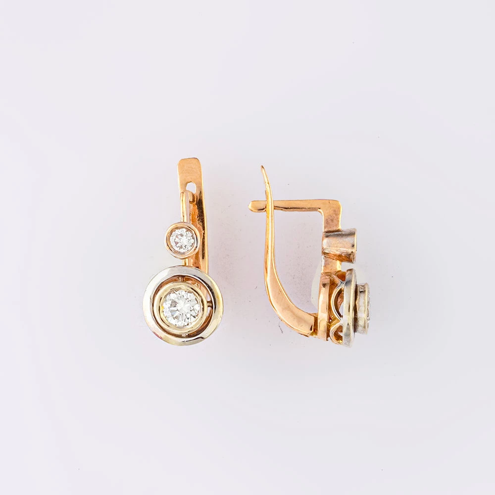 Серьги с бриллиантом из красного золота 585 пробы