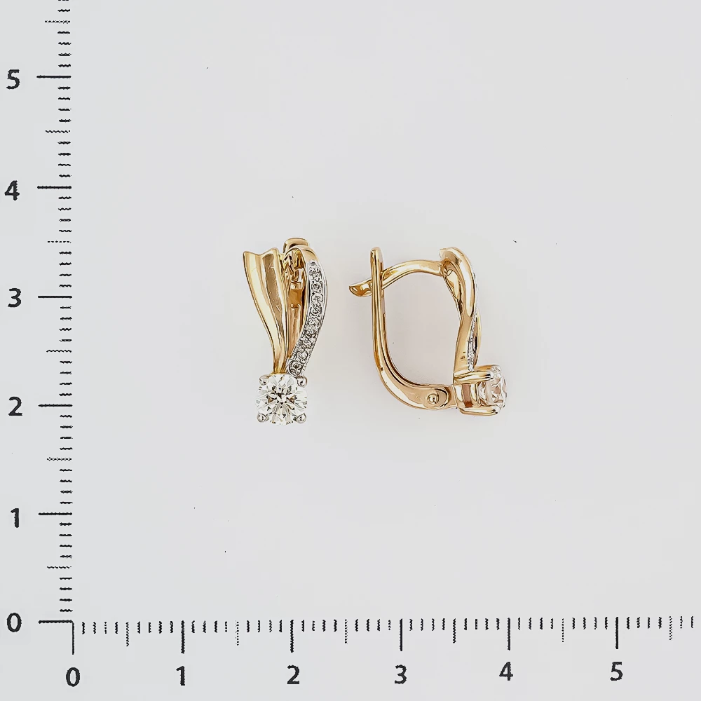 Серьги с бриллиантом из красного золота 585 пробы