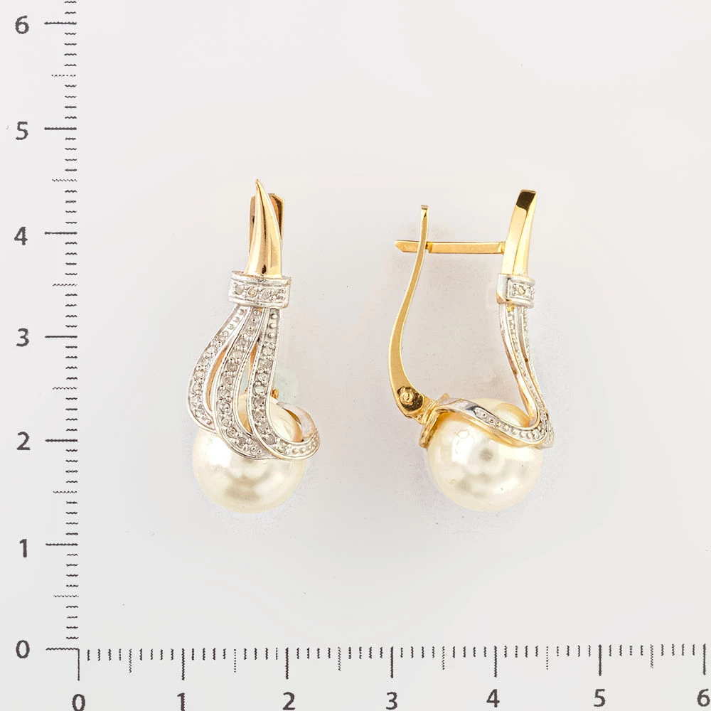 Серьги с бриллиантом из желтого золота 500 пробы