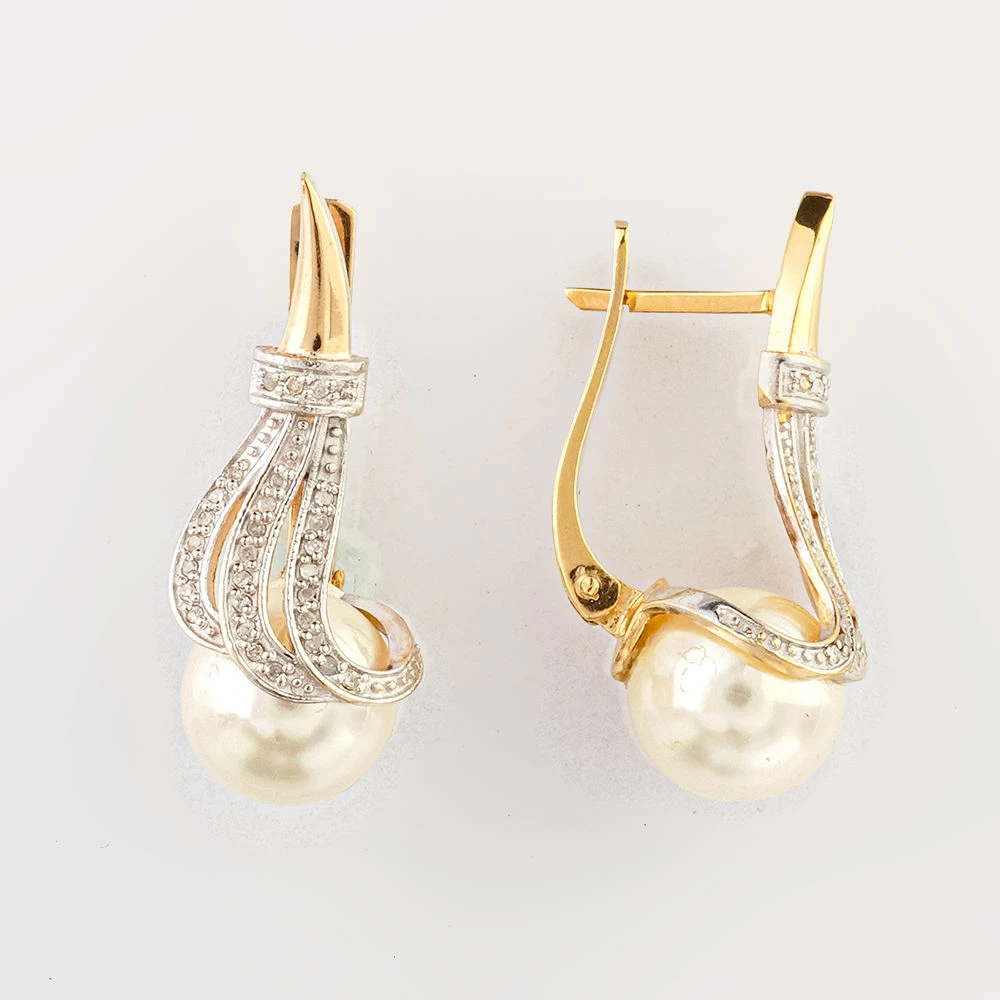 Серьги с бриллиантом из желтого золота 500 пробы