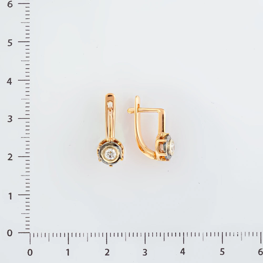 Серьги с бриллиантом из красного золота 585 пробы