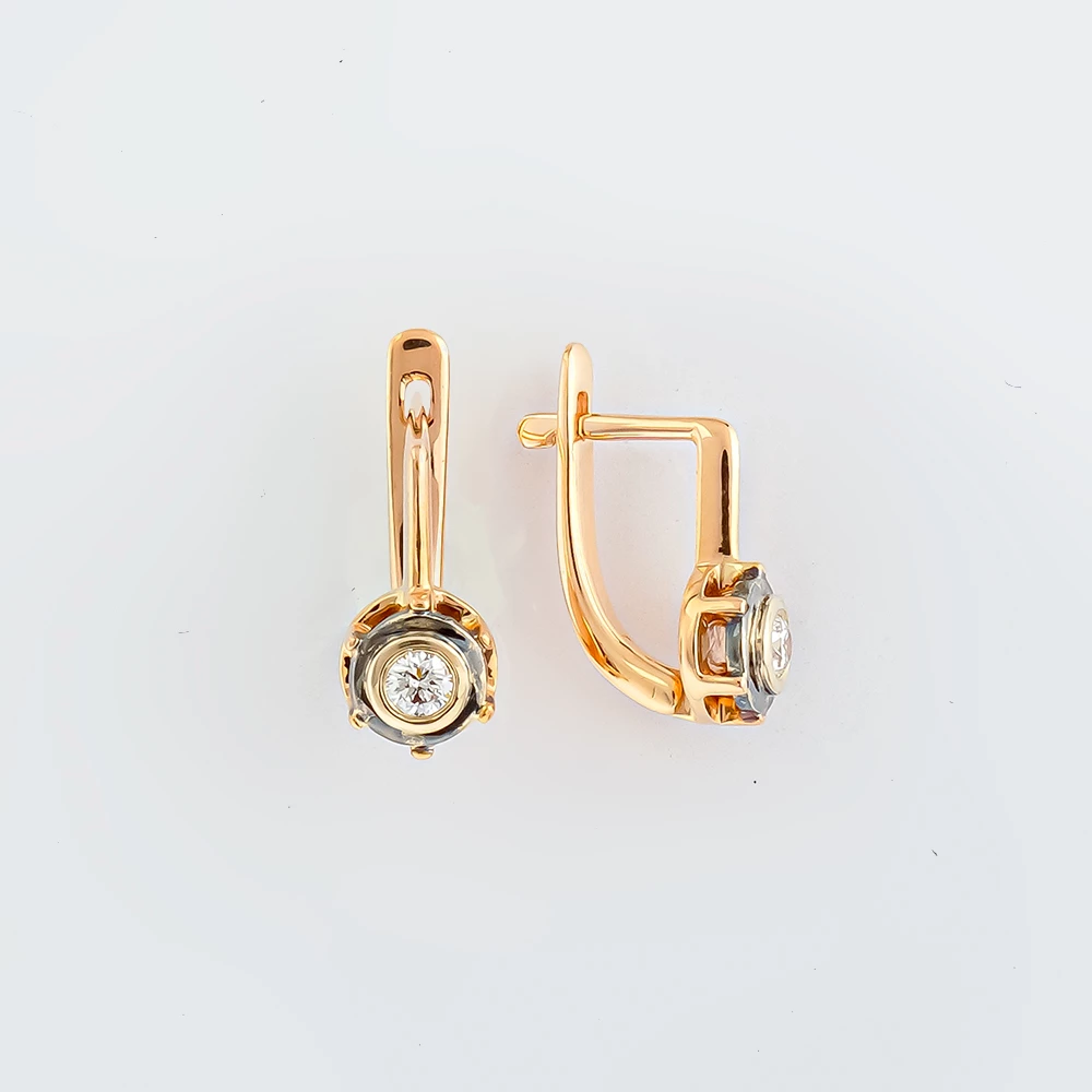 Серьги с бриллиантом из красного золота 585 пробы