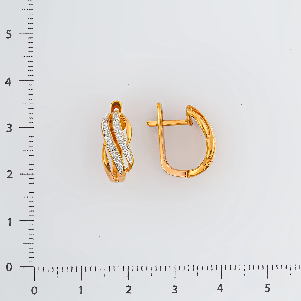 Серьги с бриллиантом из красного золота 585 пробы