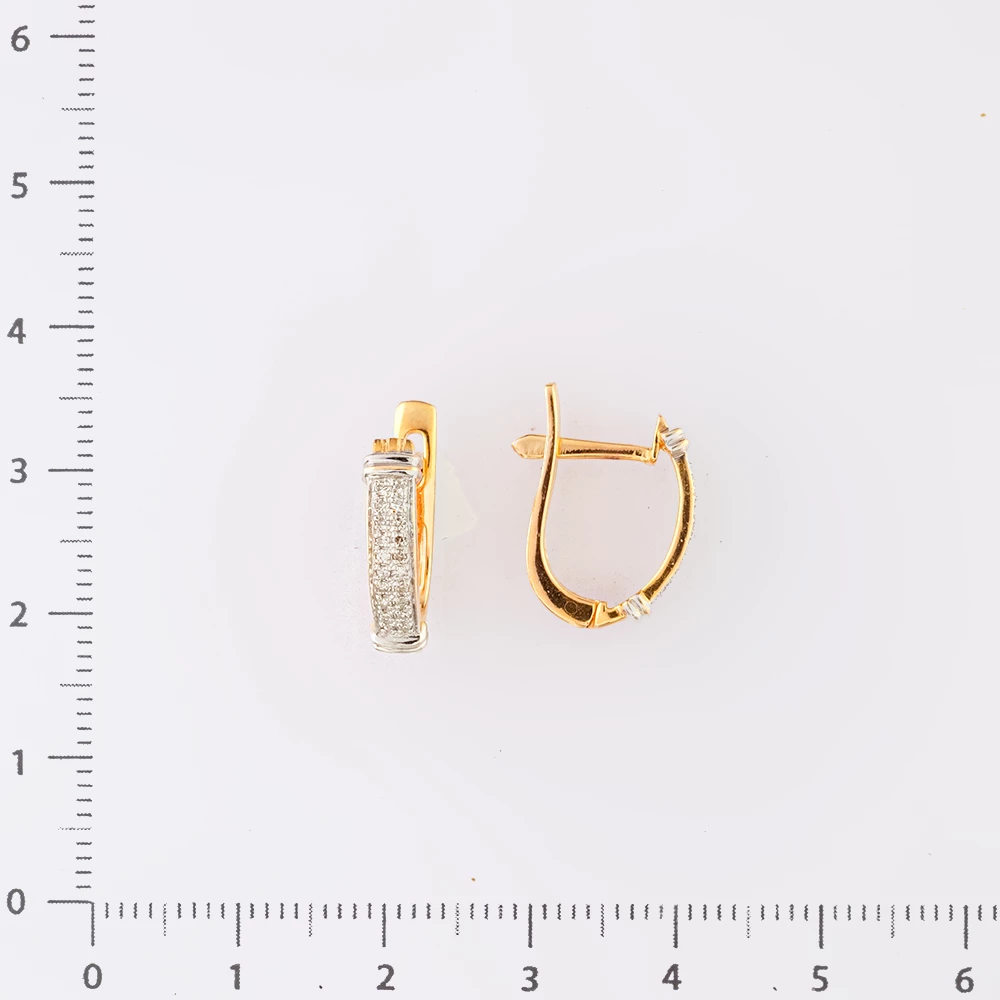 Серьги с бриллиантом из красного золота 585 пробы