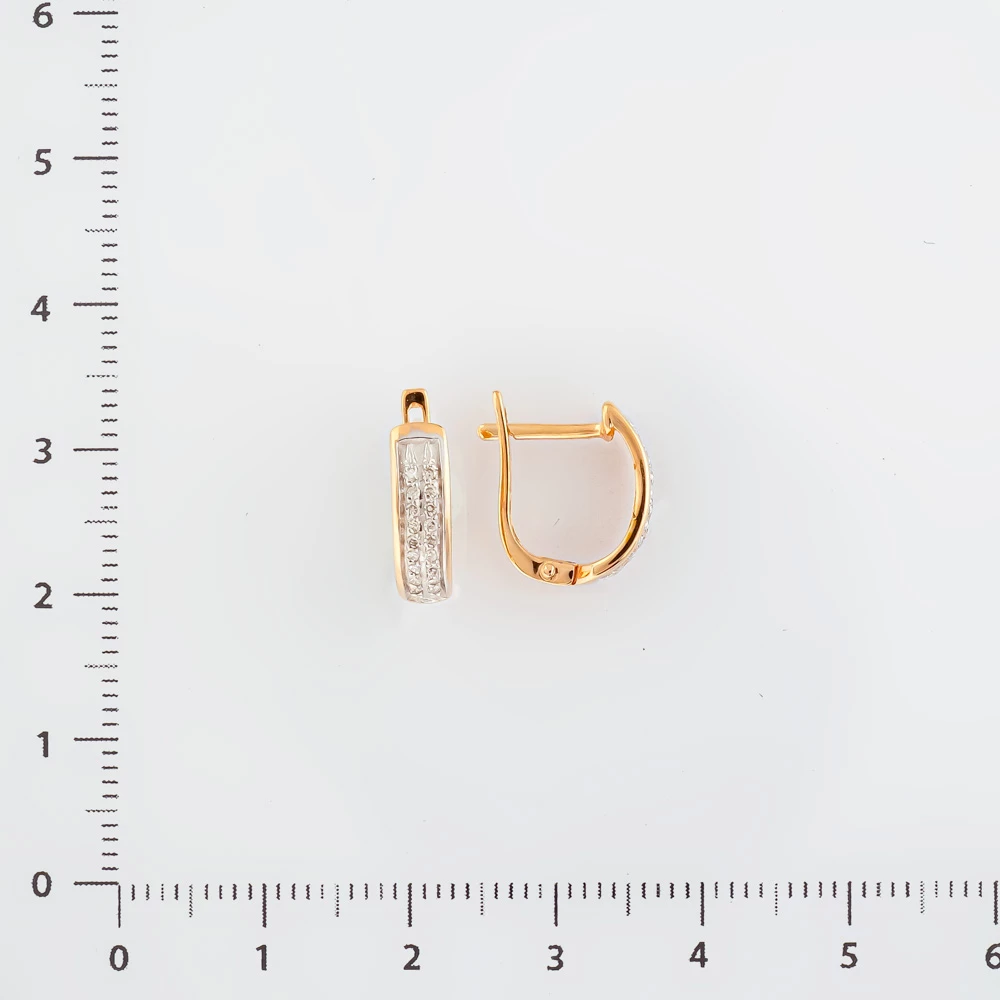 Серьги с бриллиантом из красного золота 585 пробы