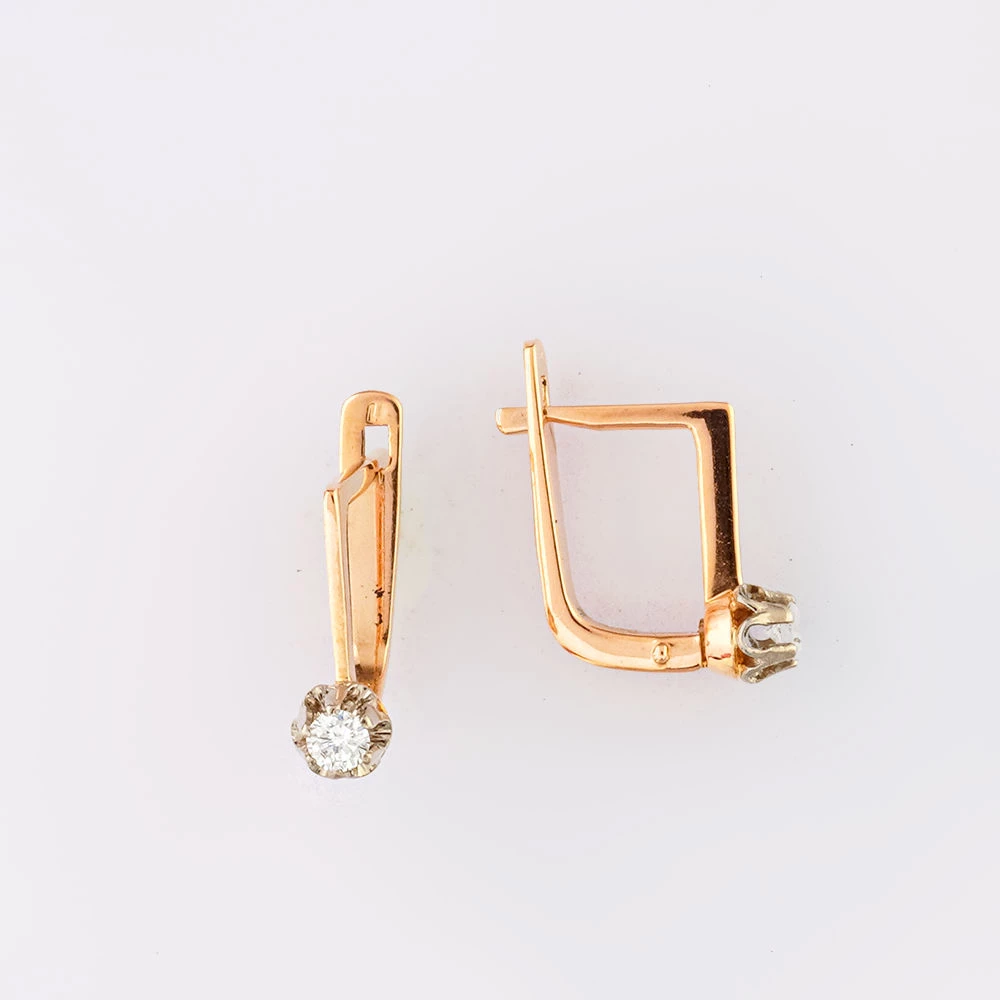 Серьги с бриллиантом из красного золота 583 пробы