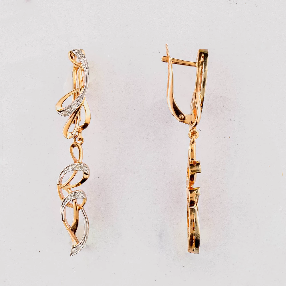 Серьги с бриллиантом из красного золота 585 пробы