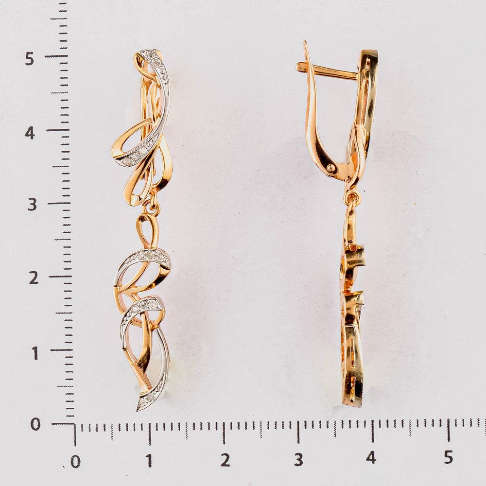 Серьги с бриллиантом из красного золота 585 пробы