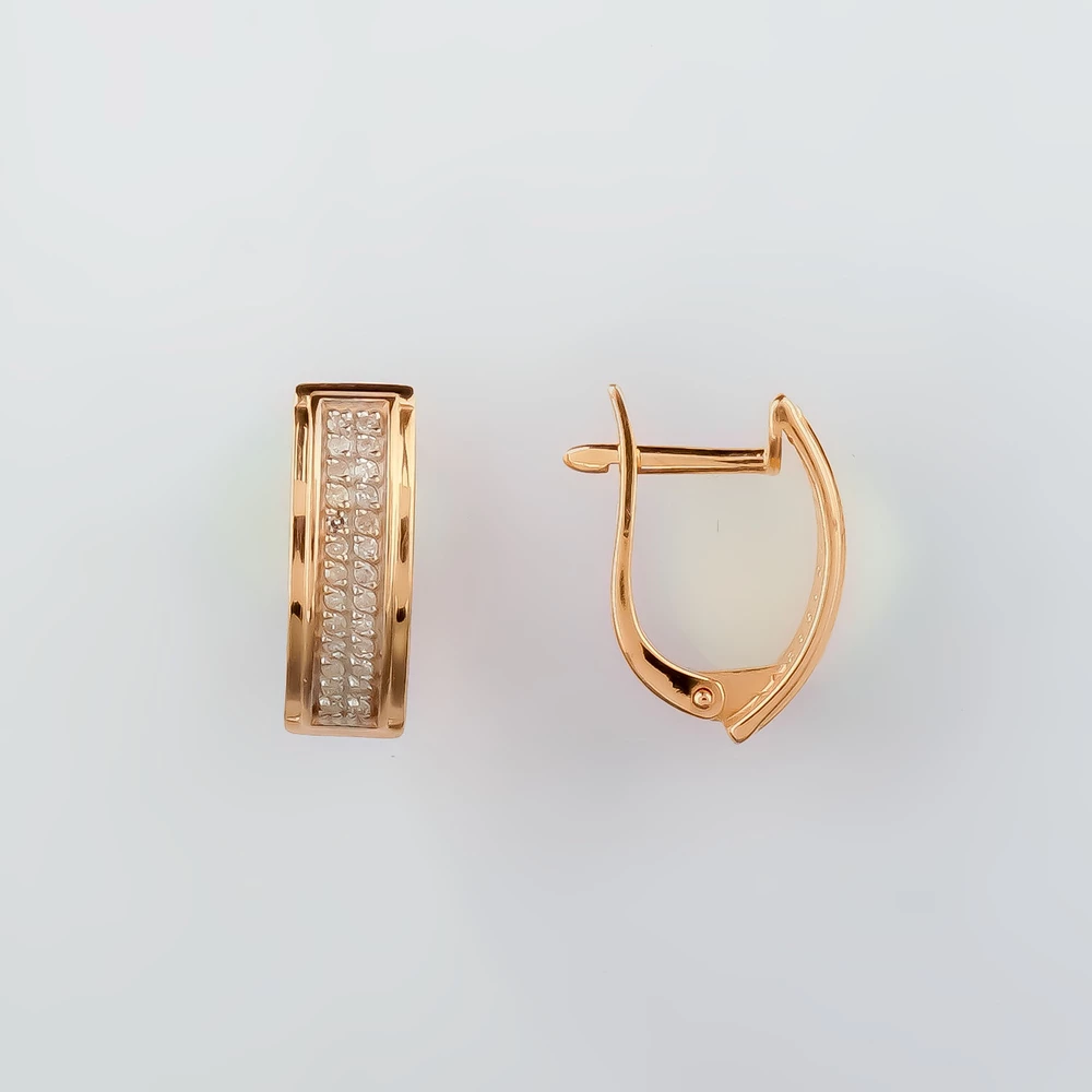 Серьги с бриллиантом из красного золота 585 пробы