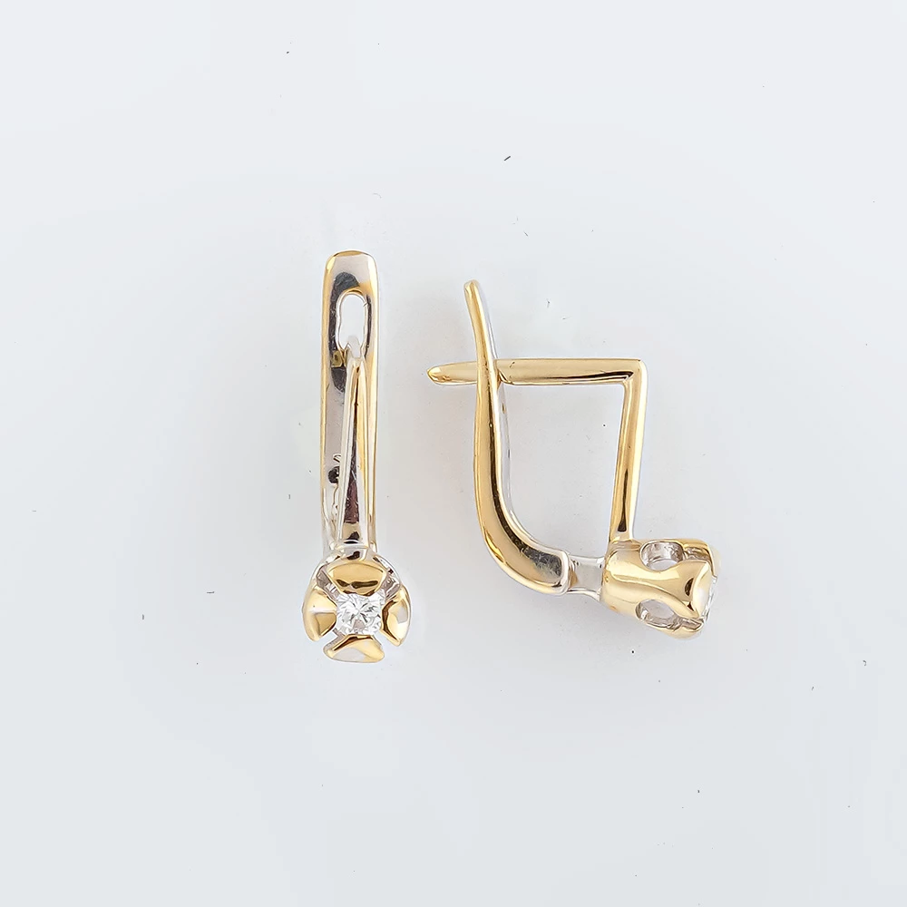 Серьги с бриллиантом из белого золота 750 пробы