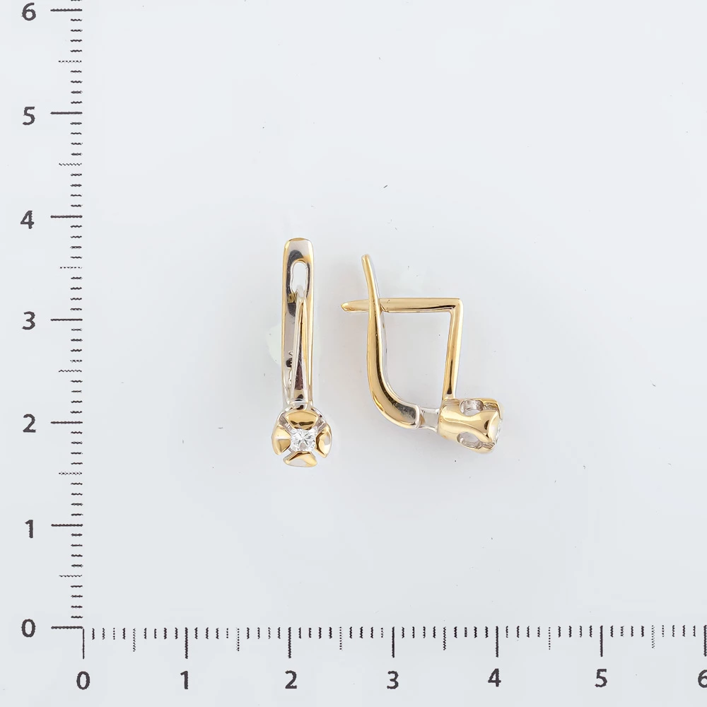 Серьги с бриллиантом из белого золота 750 пробы