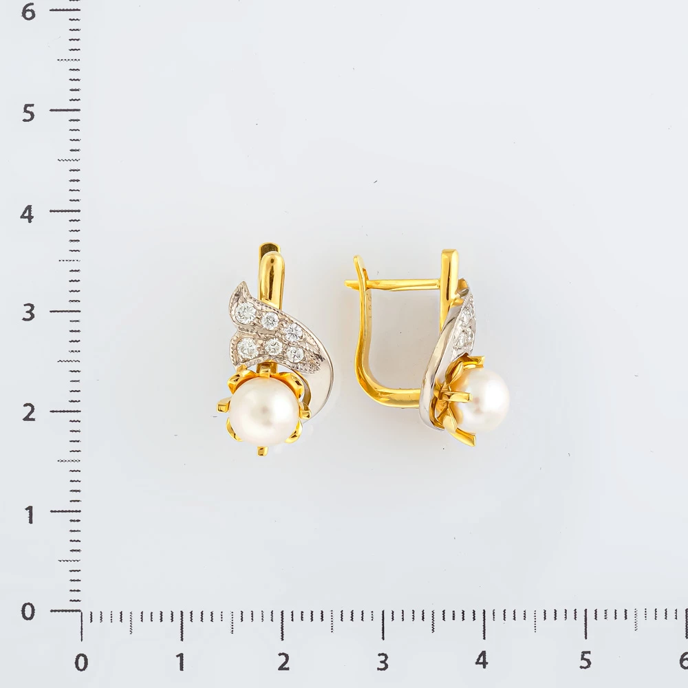 Серьги с бриллиантом из желтого золота 750 пробы