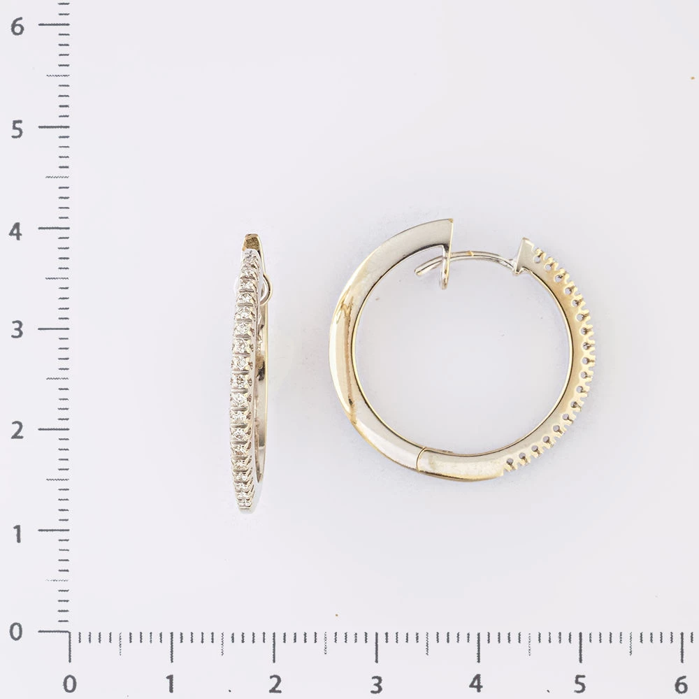 Серьги конго с бриллиантом из белого золота 750 пробы